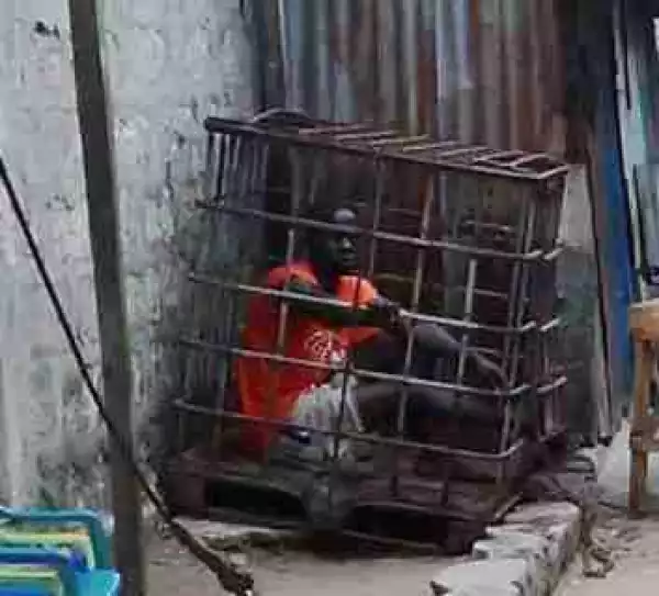 Man Put In A Cage In Delta State As A Form Of Punishment (Photos)